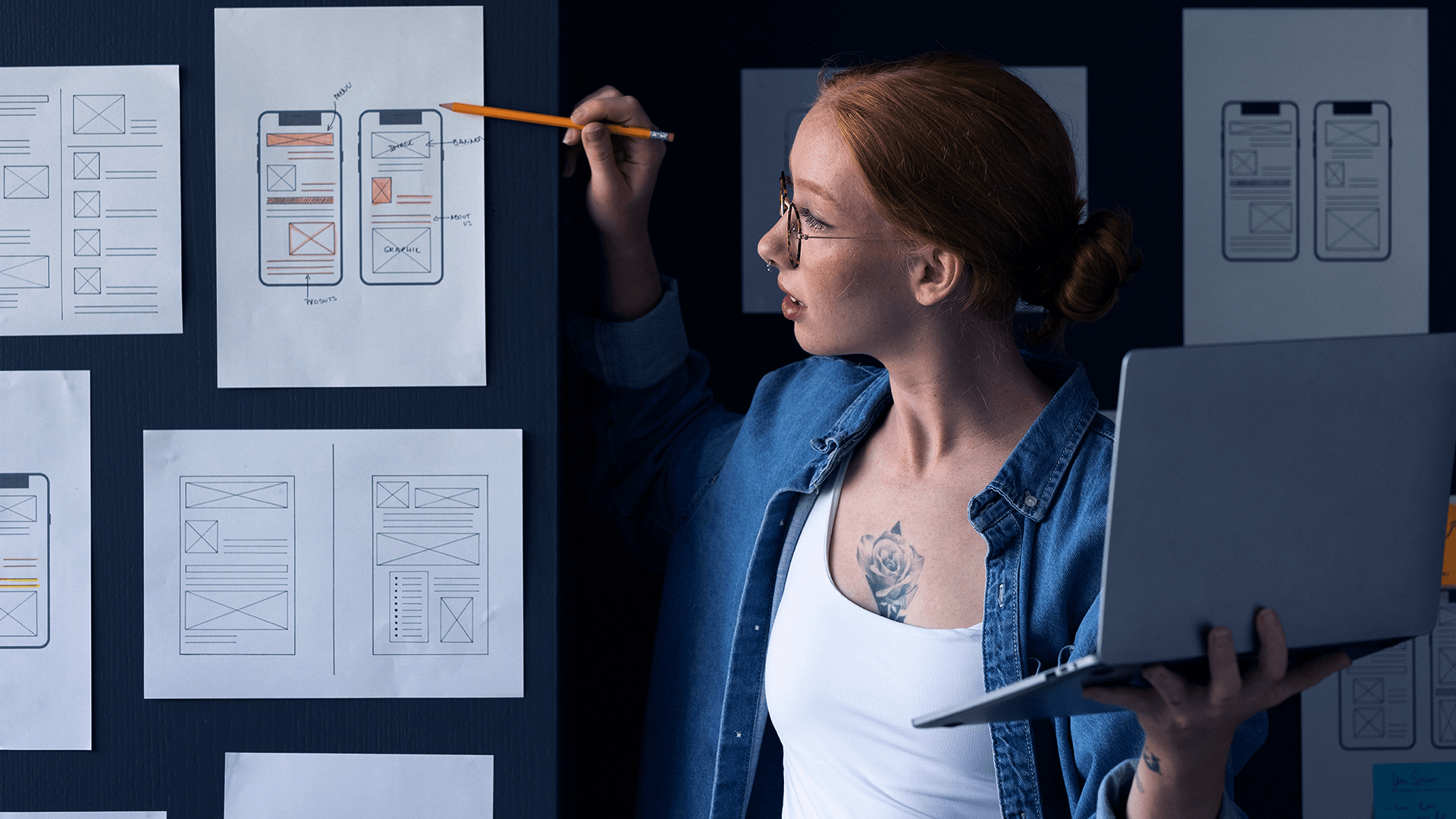 Woman working on UX design project, symbolizing the importance of UX for startups.