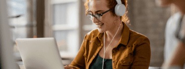 Professional working on the computer, symbolizing Computer-Assisted Learning