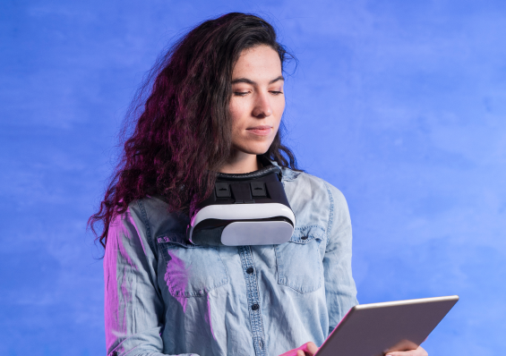 Women using VR headsets to symbolize digital experiences.