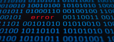 The code on the screen shows an error, symbolizing the risk of building on legacy code.
